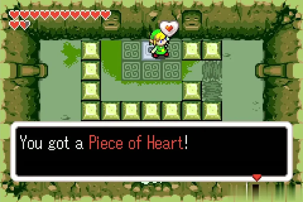 Link holding up the Piece of Heart with the full item message in the block cave Link holding up the Piece of Heart with the full item message in the block cave