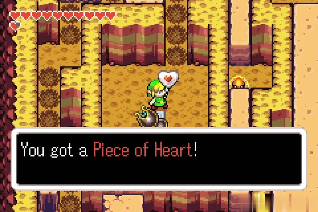 Link holding up a Piece of Heart in the Mole Mitts cave Link holding up a Piece of Heart in the Mole Mitts cave