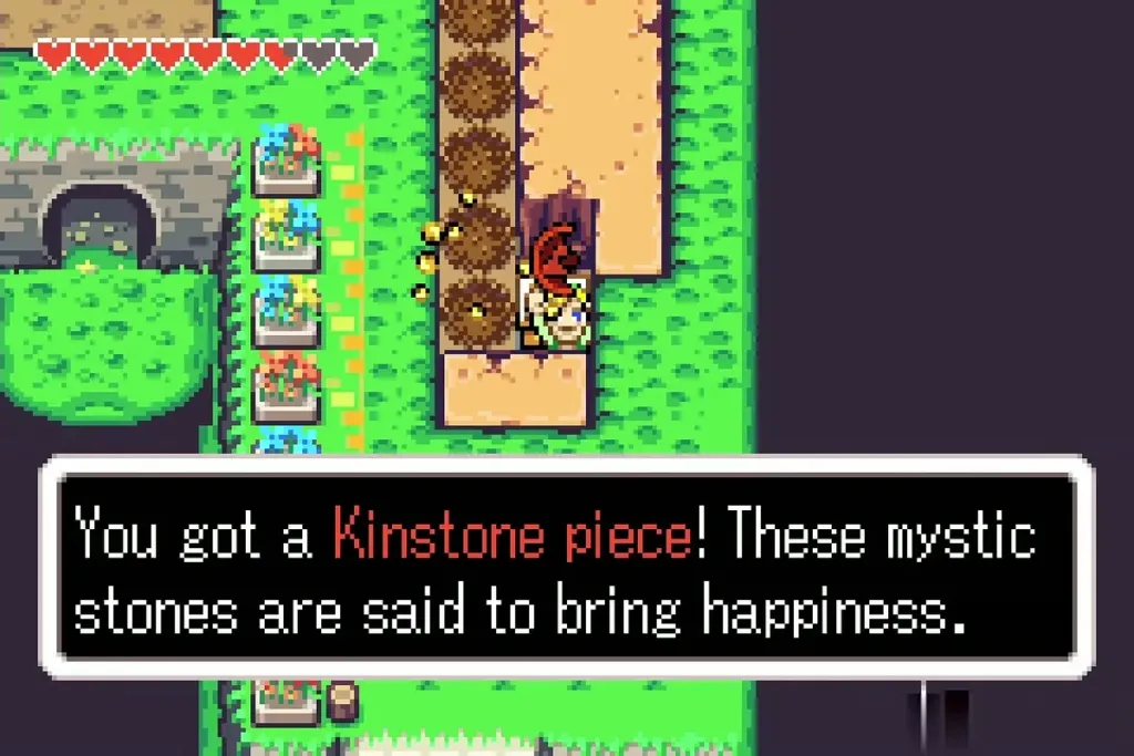 Link holding up a red Kinstone piece with the message box fully shown Link holding up a red Kinstone piece with the message box fully shown