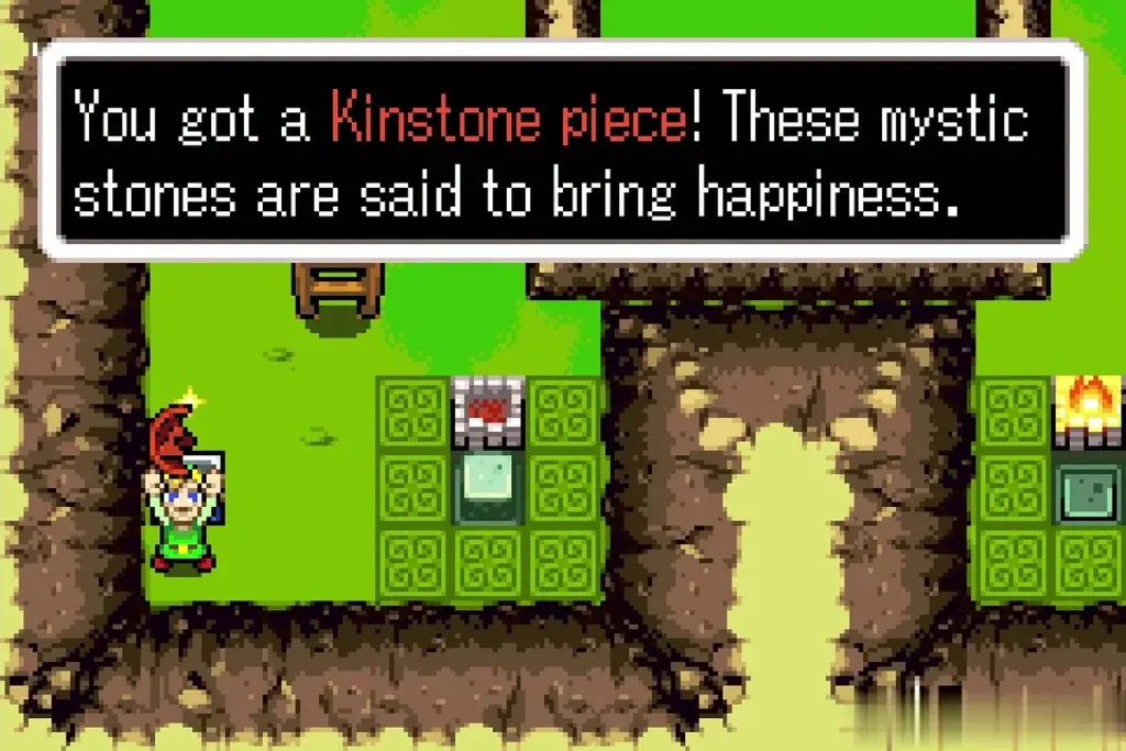 Link holding up a red Kinstone piece with the full message box Link holding up a red Kinstone piece with the full message box