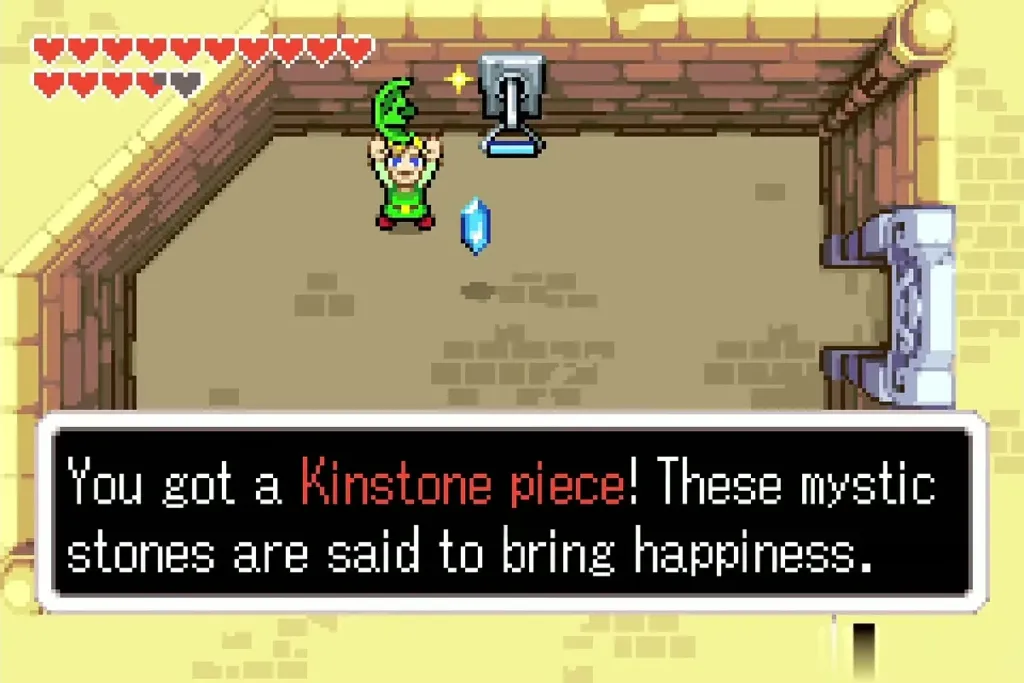 Link holding up a Kinstone piece with its message fully shown Link holding up a Kinstone piece with its message fully shown
