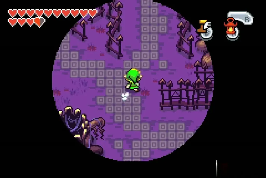 Link walking a fenced graveyard path with the Flame Lantern widening his light