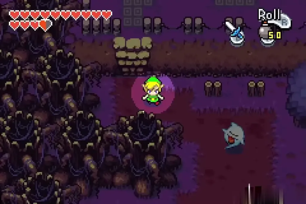 Link in a small circle of light with a ghost drifting nearby in the dark graveyard