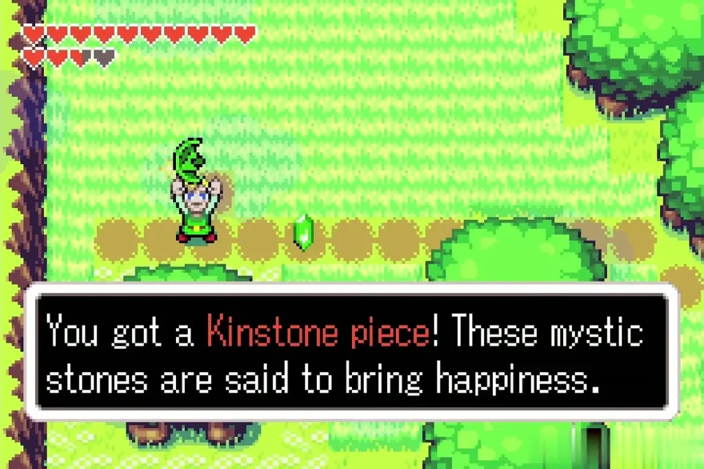 Link holding up a green Kinstone piece with the item message shown