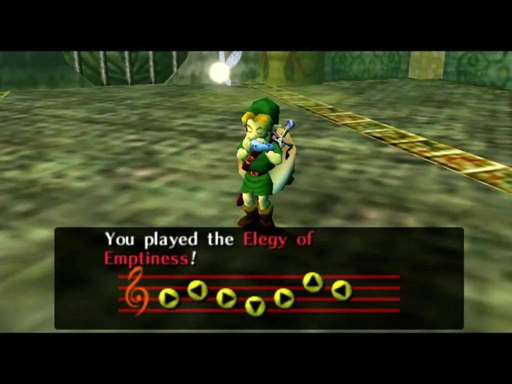 Link plays the ocarina in a stone chamber, the box reading You played the Elegy of Emptiness with its notes on the staff Link plays the ocarina in a stone chamber, the box reading You played the Elegy of Emptiness with its notes on the staff
