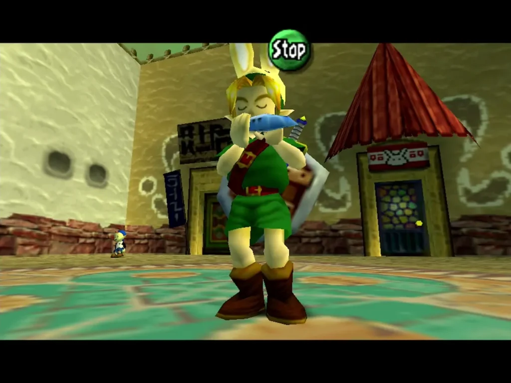 Link in the Bunny Hood plays the Song of Time on his ocarina in a Clock Town square, with the Stop prompt above Link in the Bunny Hood plays the Song of Time on his ocarina in a Clock Town square, with the Stop prompt above