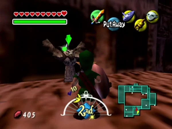 Link stands beside an owl statue with a green gem above its wings as he strikes it with his sword Link stands beside an owl statue with a green gem above its wings as he strikes it with his sword