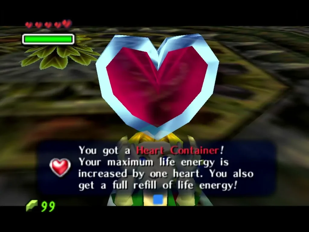 Link holds up a Heart Container, the box saying his maximum life energy increases by one heart Link holds up a Heart Container, the box saying his maximum life energy increases by one heart