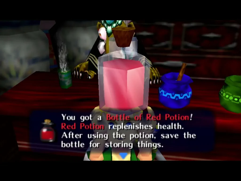 Link holds up a Bottle of Red Potion, with its name box on screen Link holds up a Bottle of Red Potion, with its name box on screen