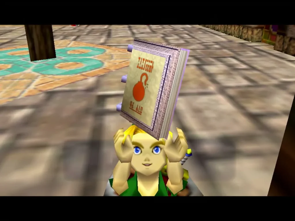 Hylian Link holds the Bombers' Notebook overhead on a stone plaza, just before the Quest Status instructions appear Hylian Link holds the Bombers' Notebook overhead on a stone plaza, just before the Quest Status instructions appear