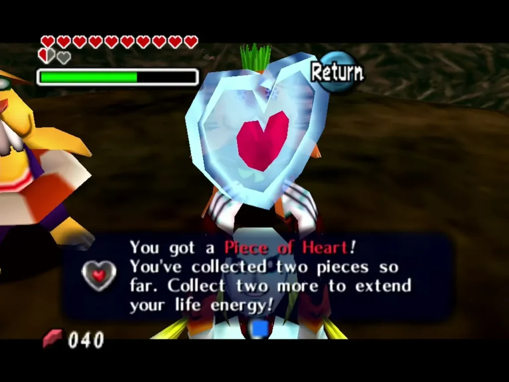 Zora Link holds up a Piece of Heart won from the Beaver Brothers, the box shown in full Zora Link holds up a Piece of Heart won from the Beaver Brothers, the box shown in full