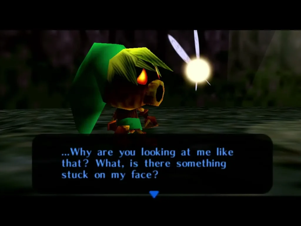 Deku Link in the dark forest, Tatl's dialogue box asking if something is stuck on his face Deku Link in the dark forest, Tatl's dialogue box asking if something is stuck on his face
