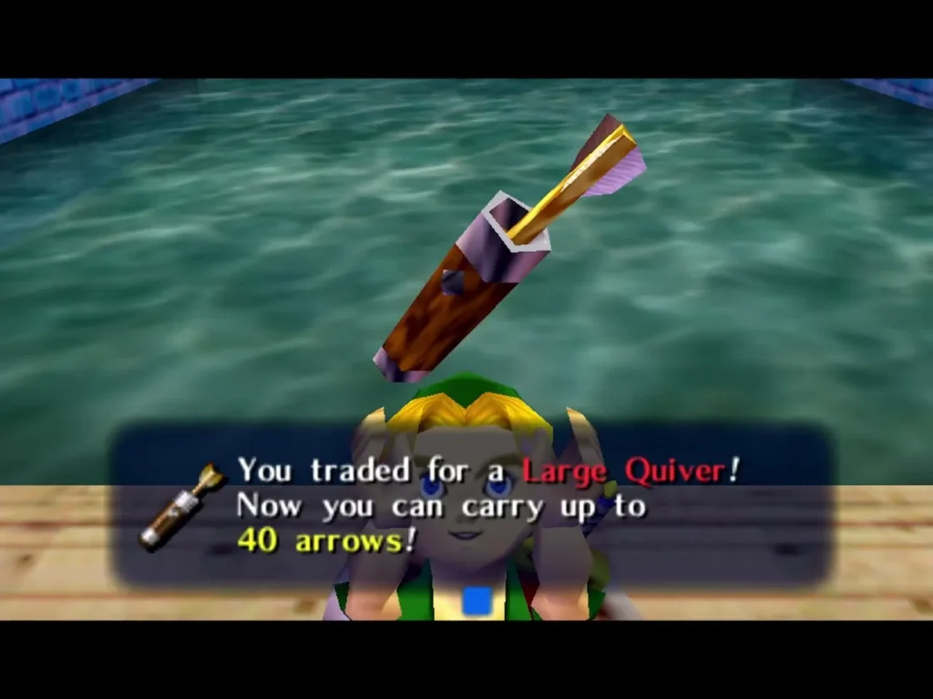 Link holding up the Large Quiver, the box saying he can now carry up to 40 arrows Link holding up the Large Quiver, the box saying he can now carry up to 40 arrows
