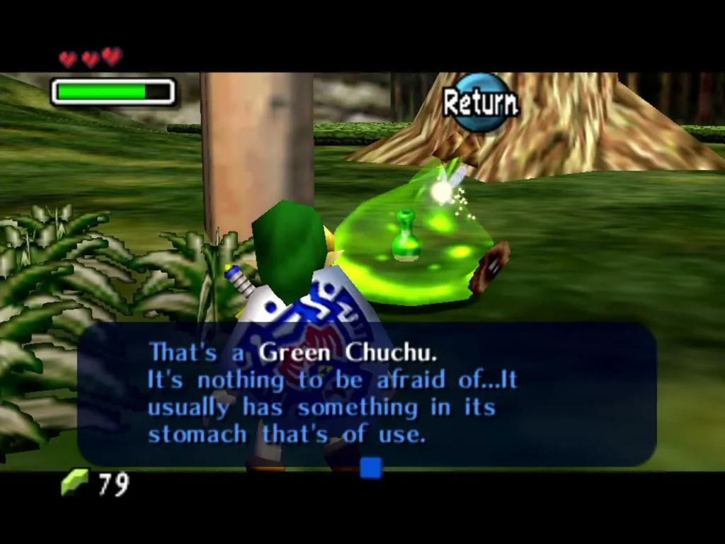 Link facing a Green ChuChu in a grassy clearing, the message box naming it a Green ChuChu Link facing a Green ChuChu in a grassy clearing, the message box naming it a Green ChuChu