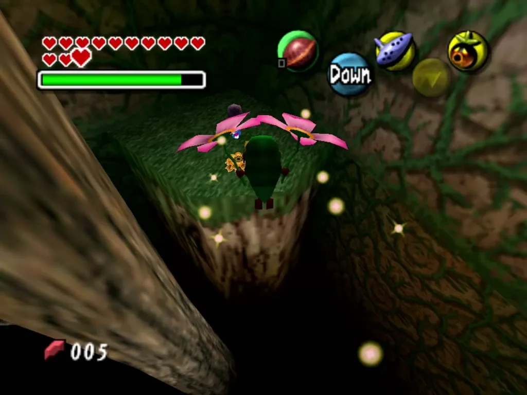 Deku Link launching from a pink flower inside the mossy Deku trial Deku Link launching from a pink flower inside the mossy Deku trial