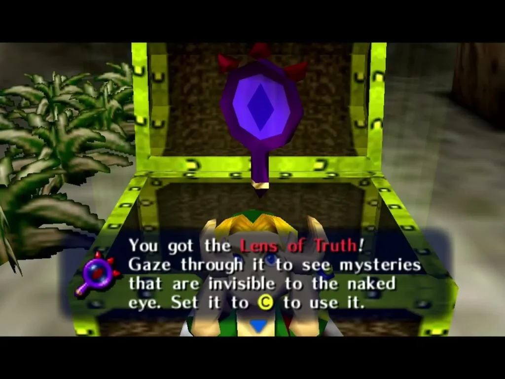 The box reads You got the Lens of Truth, with the lens held above the open chest The box reads You got the Lens of Truth, with the lens held above the open chest
