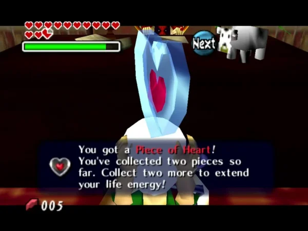 Link holds up a Piece of Heart after settling the argument in the Mayor's meeting