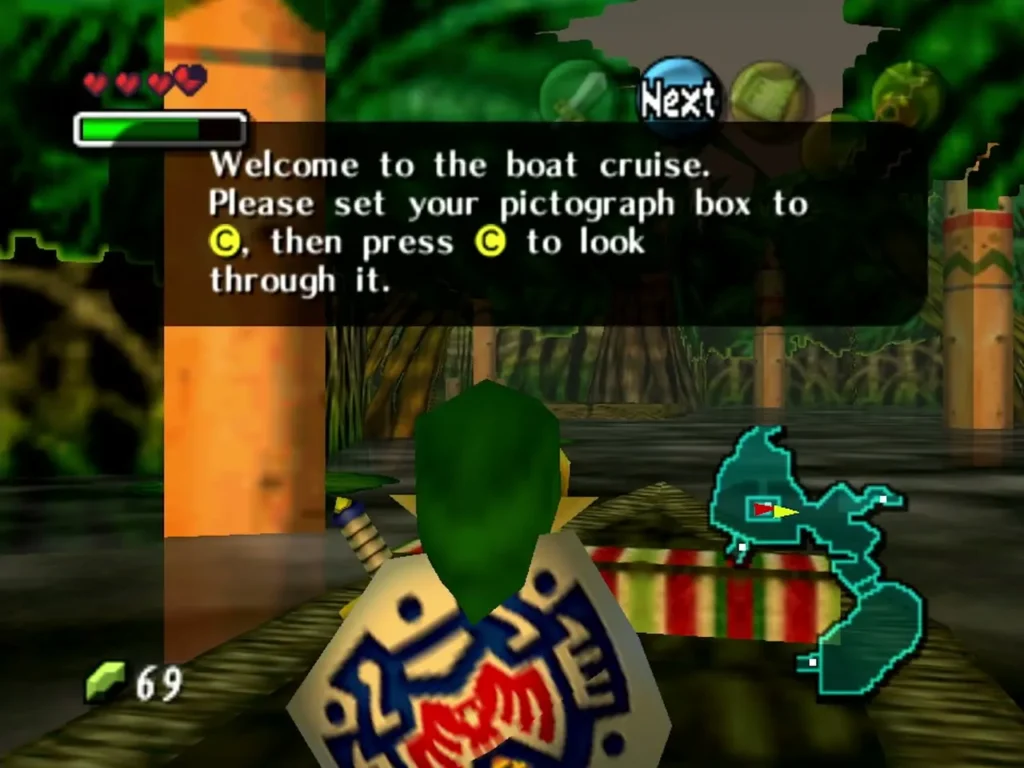 Boat cruise welcome message telling Link to set the pictograph box to C, with Link on the swamp boat Boat cruise welcome message telling Link to set the pictograph box to C, with Link on the swamp boat