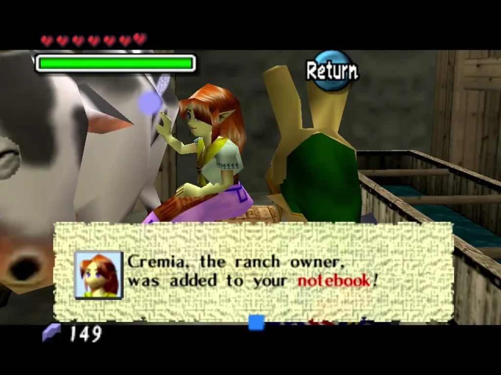 Cremia sits by a cow as the box says the ranch owner was added to the notebook Cremia sits by a cow as the box says the ranch owner was added to the notebook
