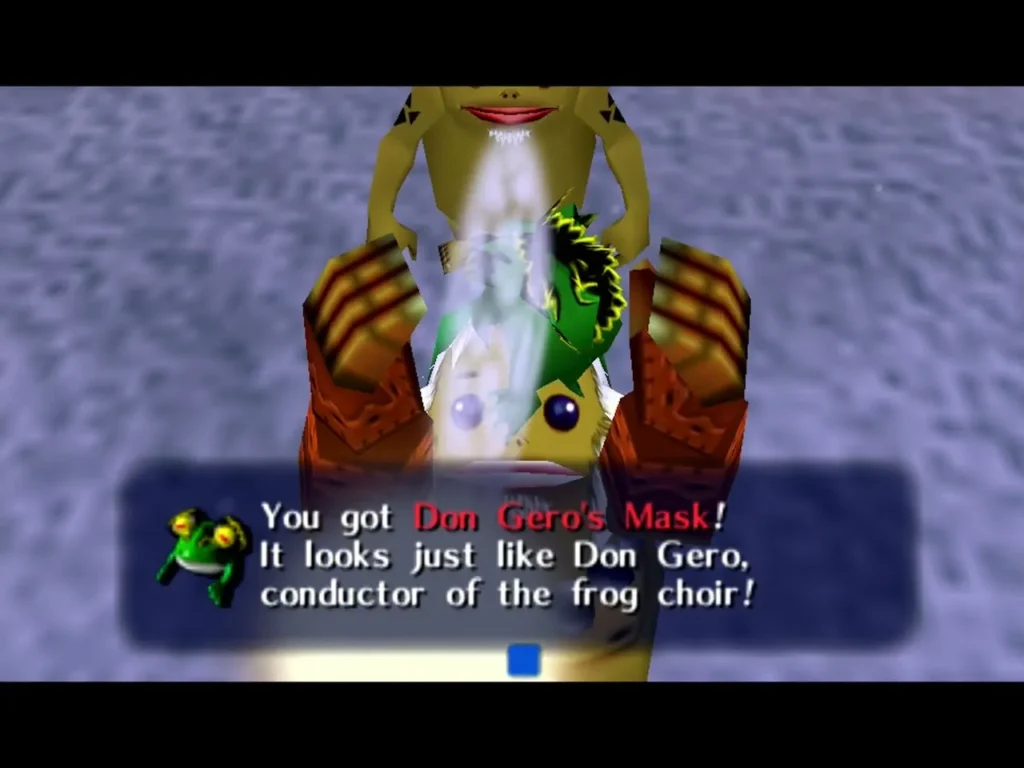 Goron Link holds up Don Gero's Mask, the box calling it the conductor of the frog choir Goron Link holds up Don Gero's Mask, the box calling it the conductor of the frog choir