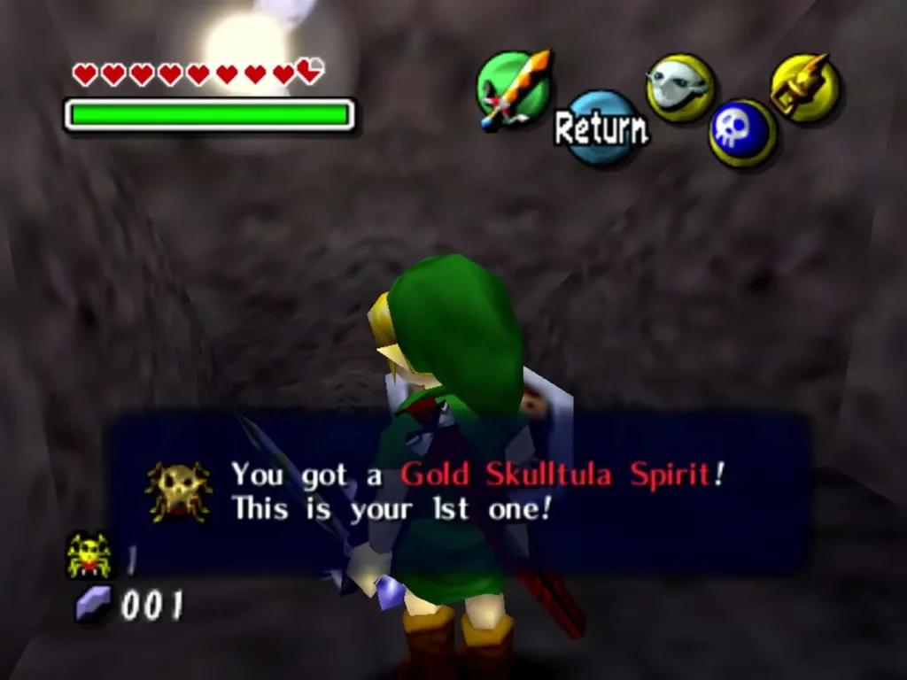 Link in a dark Oceanside Spider House corridor after his first Gold Skulltula Spirit, the box reading This is your 1st one Link in a dark Oceanside Spider House corridor after his first Gold Skulltula Spirit, the box reading This is your 1st one