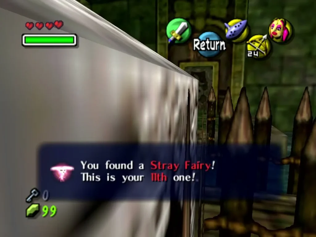 Link beside a stone block and spiked fence in Woodfall Temple as the box reports a Stray Fairy found Link beside a stone block and spiked fence in Woodfall Temple as the box reports a Stray Fairy found