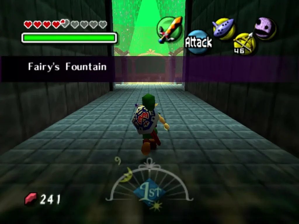 Link runs down a stone corridor toward the green glow of the Fairy's Fountain in Ikana Canyon, its name on screen Link runs down a stone corridor toward the green glow of the Fairy's Fountain in Ikana Canyon, its name on screen