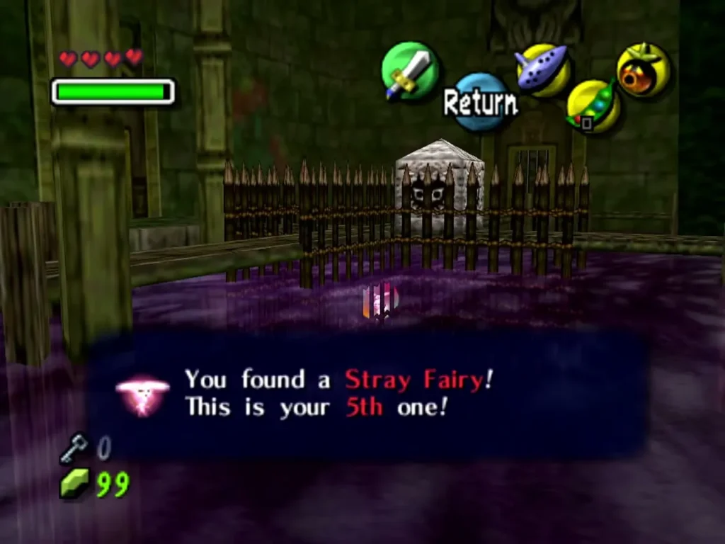 A freed Stray Fairy and its item box beside the spiked fence over poison water in Woodfall Temple A freed Stray Fairy and its item box beside the spiked fence over poison water in Woodfall Temple