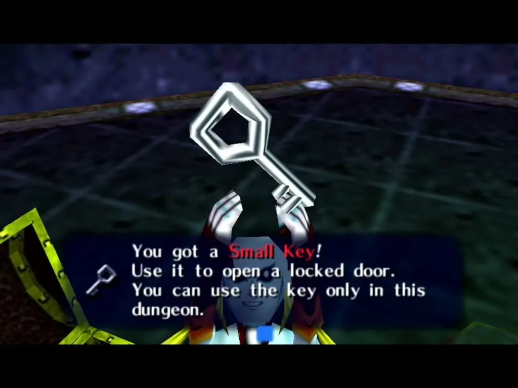 Zora Link holding up a Small Key with the full item message on screen Zora Link holding up a Small Key with the full item message on screen