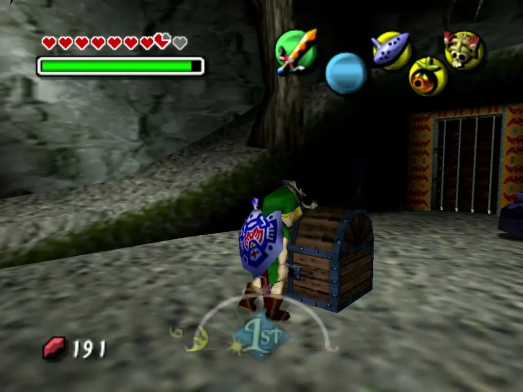 Link stands beside a wooden treasure chest in front of a barred gate in the crypt Link stands beside a wooden treasure chest in front of a barred gate in the crypt