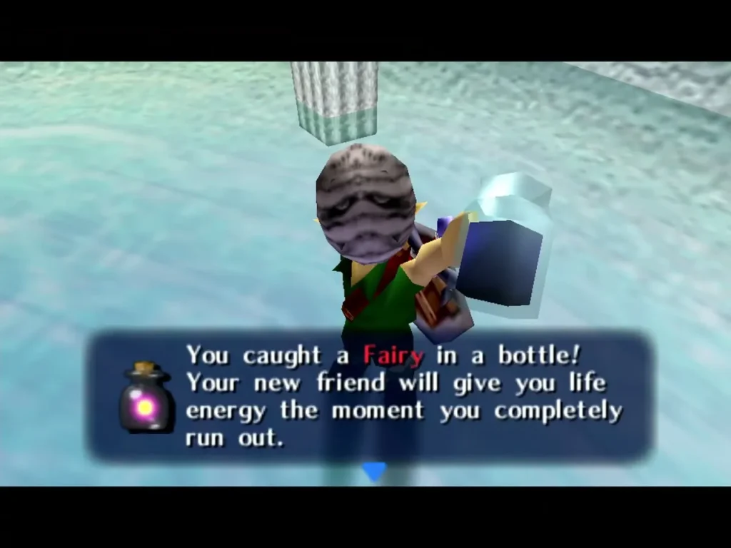 Link holds up a bottle with a freshly caught fairy glowing inside as the game confirms the catch Link holds up a bottle with a freshly caught fairy glowing inside as the game confirms the catch