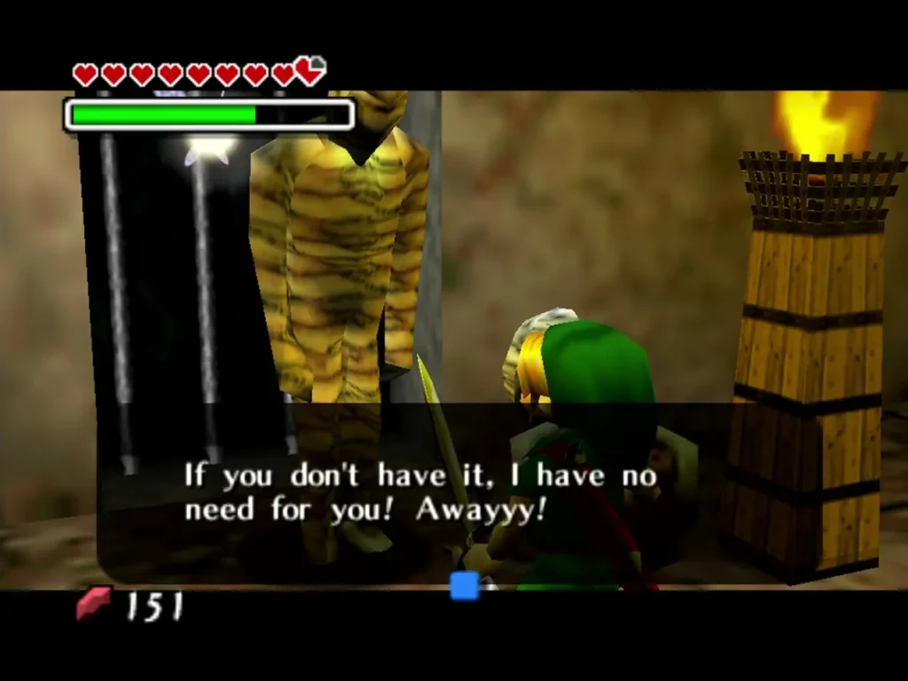A Gibdo behind a barred door tells Link he has no need for him, while Link stands by a torch A Gibdo behind a barred door tells Link he has no need for him, while Link stands by a torch