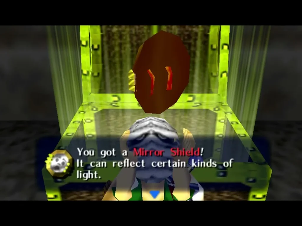 Link holds up the Mirror Shield, the box reading You got a Mirror Shield! It can reflect certain kinds of light Link holds up the Mirror Shield, the box reading You got a Mirror Shield! It can reflect certain kinds of light