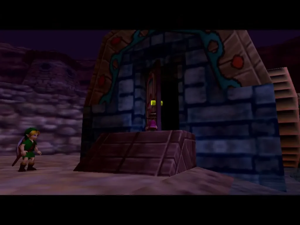 Pamela backs toward the open doorway of the Music Box House as Link approaches Pamela backs toward the open doorway of the Music Box House as Link approaches