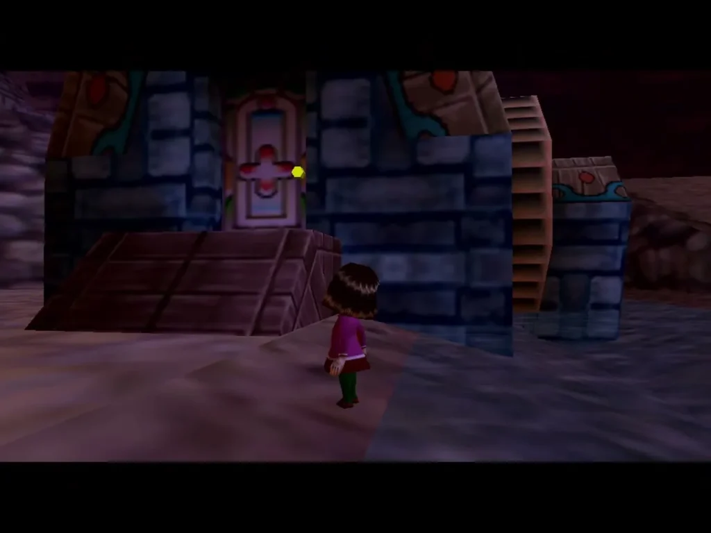 Pamela, a little girl in a pink dress, stands outside the carved door of the Music Box House Pamela, a little girl in a pink dress, stands outside the carved door of the Music Box House