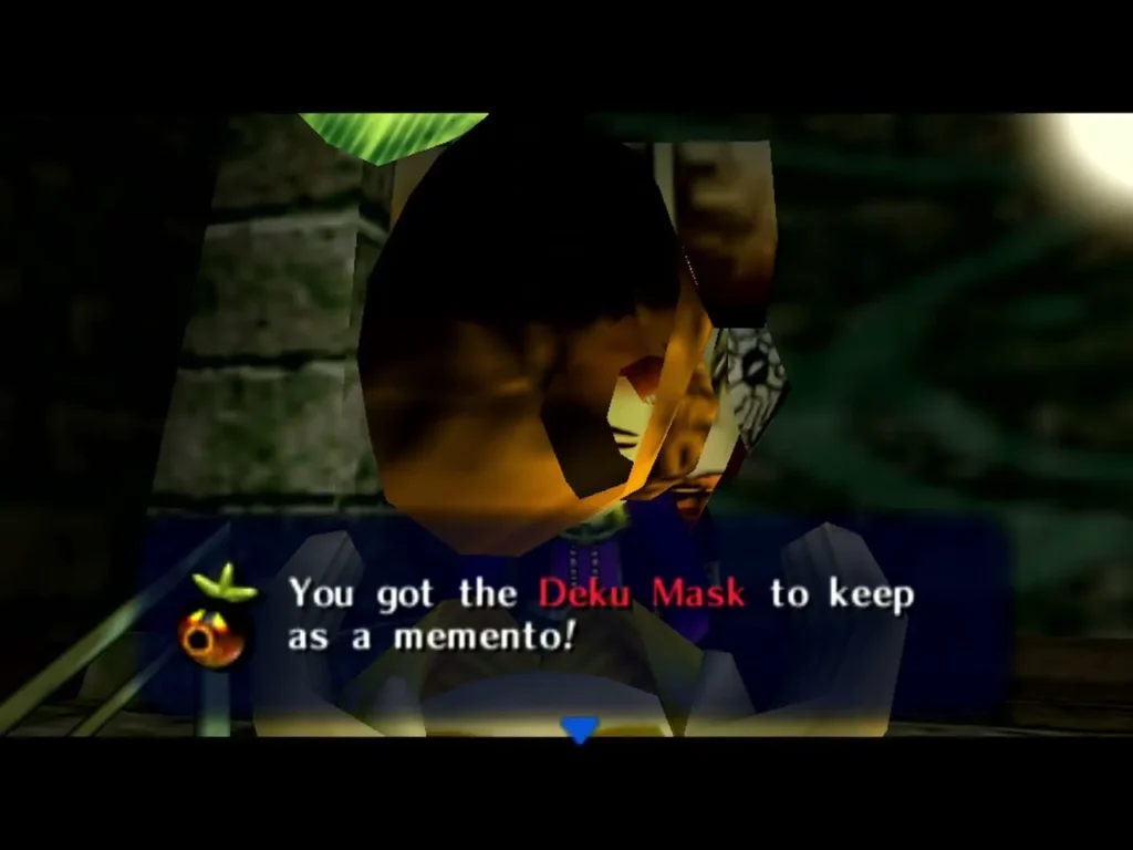 Deku Mask held up beside Link, with the box saying he got it to keep as a memento Deku Mask held up beside Link, with the box saying he got it to keep as a memento