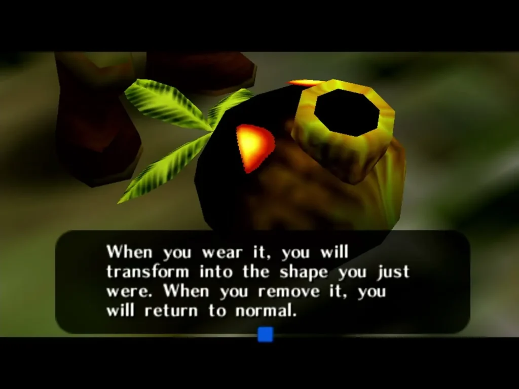 Deku Mask in front of Link, with a box saying wearing it changes his shape Deku Mask in front of Link, with a box saying wearing it changes his shape