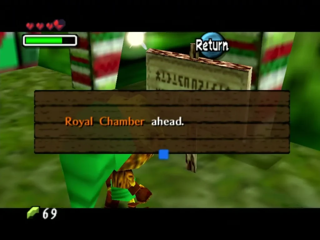 Signpost reading Royal Chamber ahead inside the Deku palace