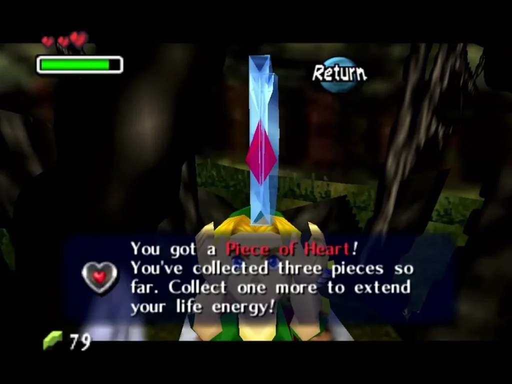 Link holding up the Piece of Heart from the withered tree, the box saying three pieces so far