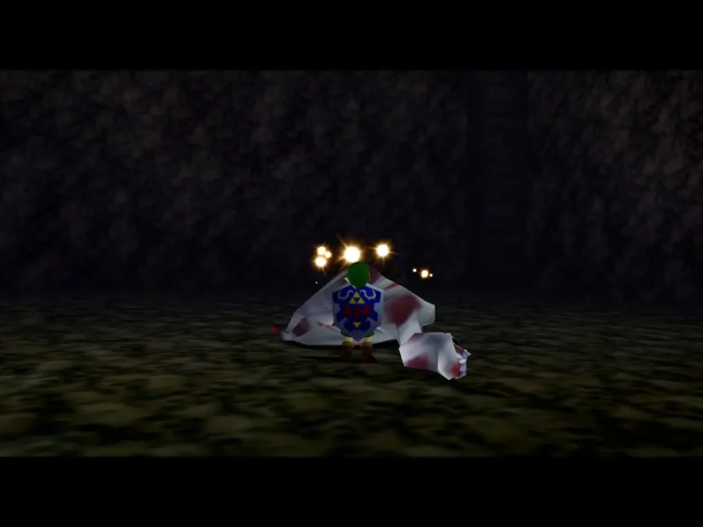 Dead Hand collapsing in a burst of sparks while Link stands nearby