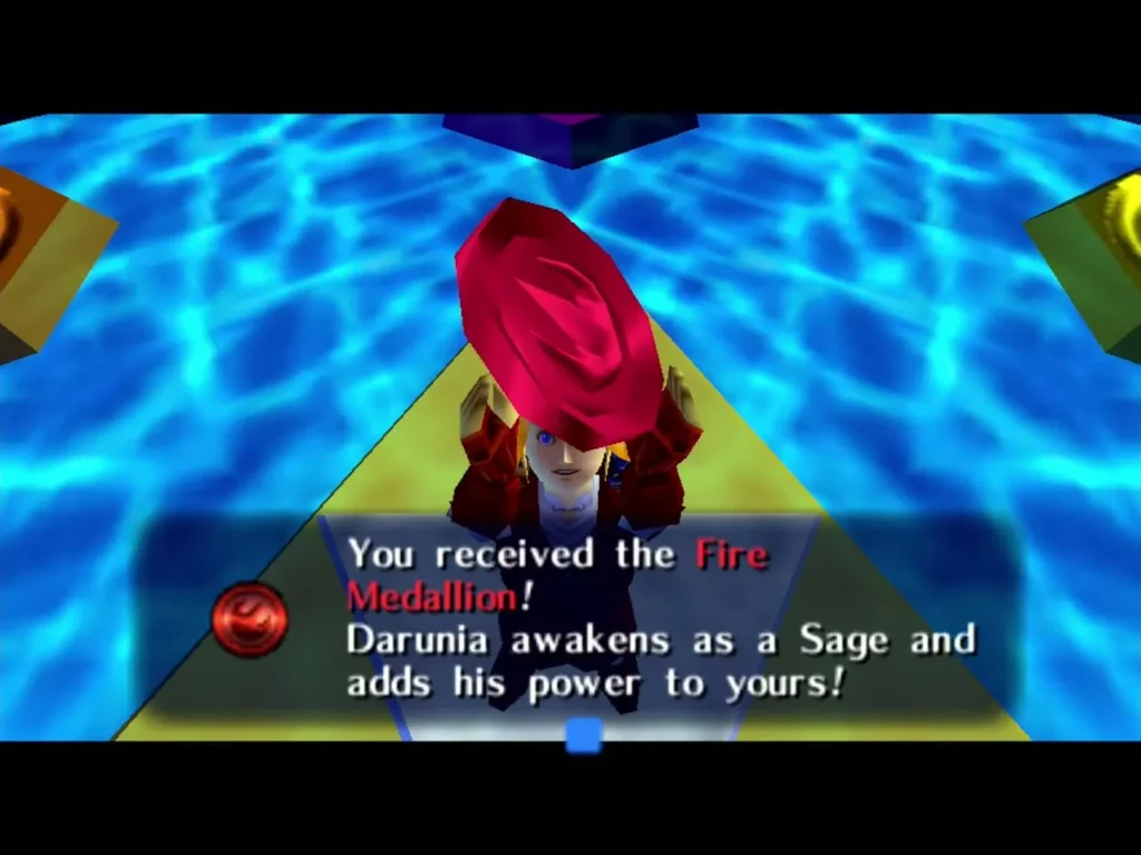 Link holding up the Fire Medallion after Darunia becomes a Sage