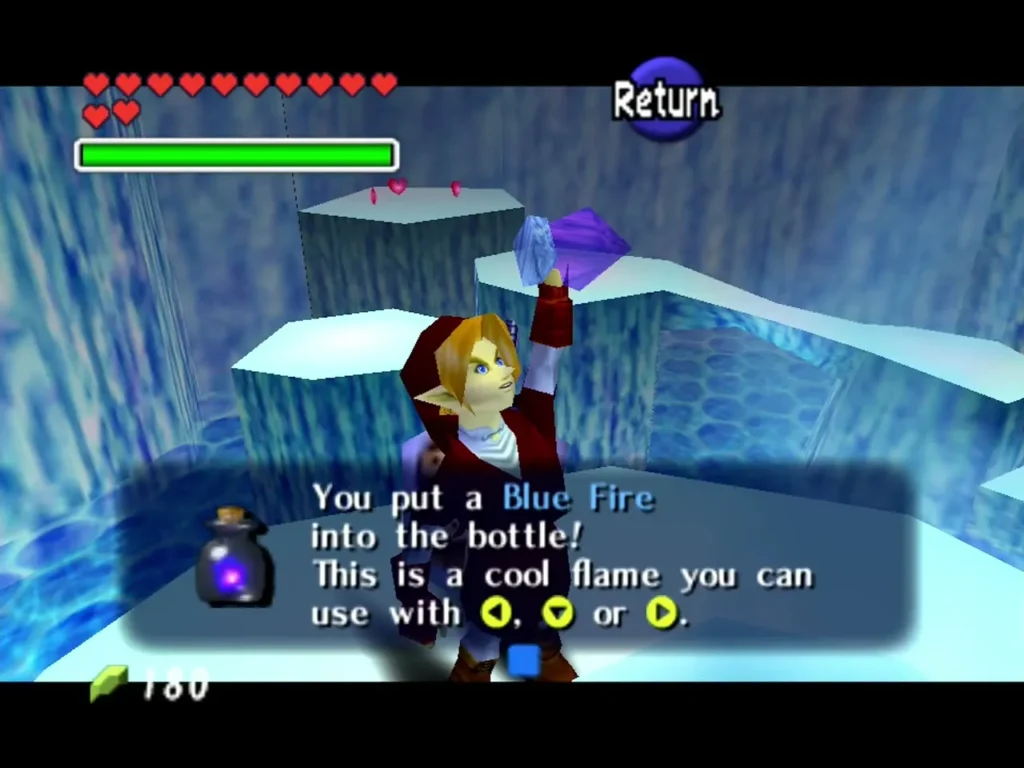 Link raising a bottle with Blue Fire inside, as the 'You put a Blue Fire into the bottle!' box shows Link raising a bottle with Blue Fire inside, as the 'You put a Blue Fire into the bottle!' box shows