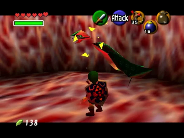 Link facing a Stinger diving across the red floor of Jabu-Jabu's Belly