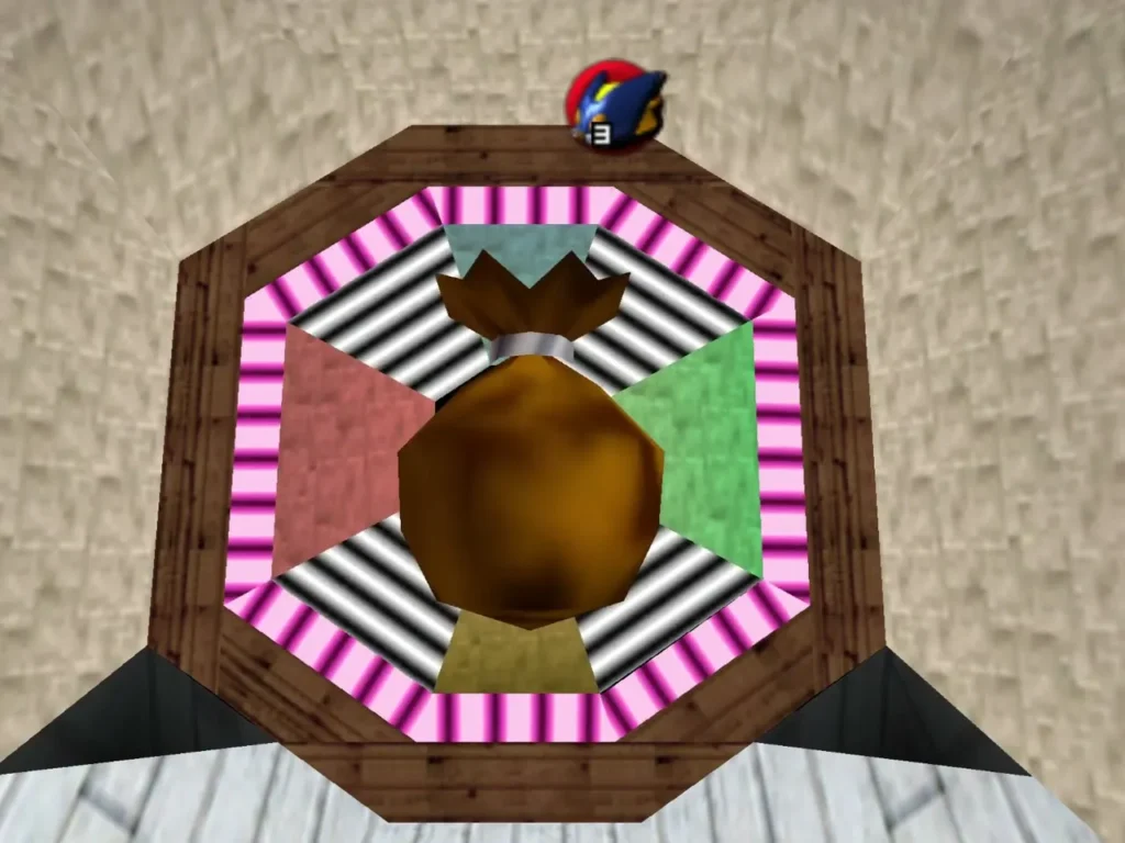 A bomb bag prize sitting on the target hole at the end of the Bombchu Bowling lane A bomb bag prize sitting on the target hole at the end of the Bombchu Bowling lane