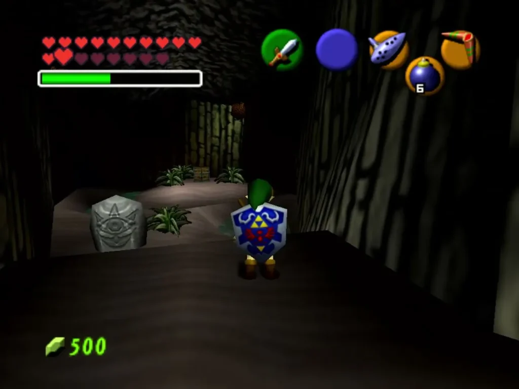 A Gossip Stone inside a dark grotto with Link standing at the entrance