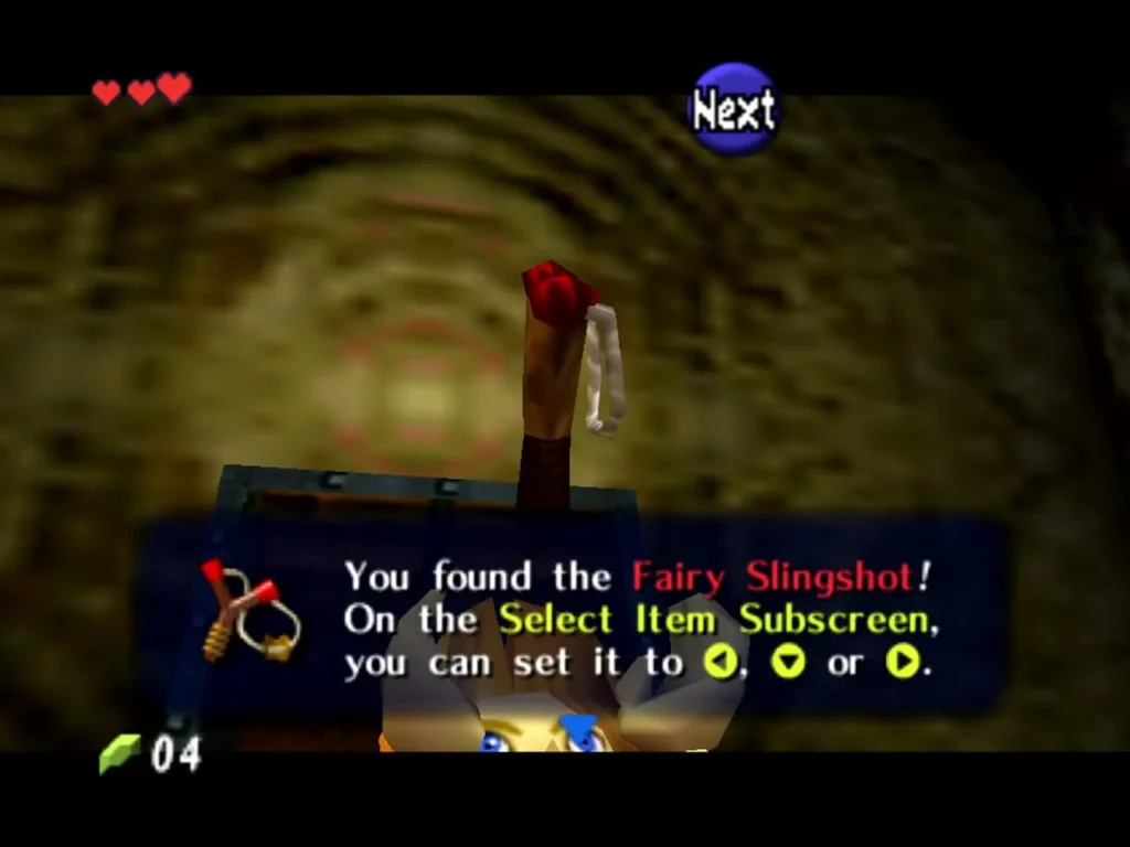 Link raising the Fairy Slingshot above a chest under the 'You found the Fairy Slingshot' box Link raising the Fairy Slingshot above a chest under the 'You found the Fairy Slingshot' box