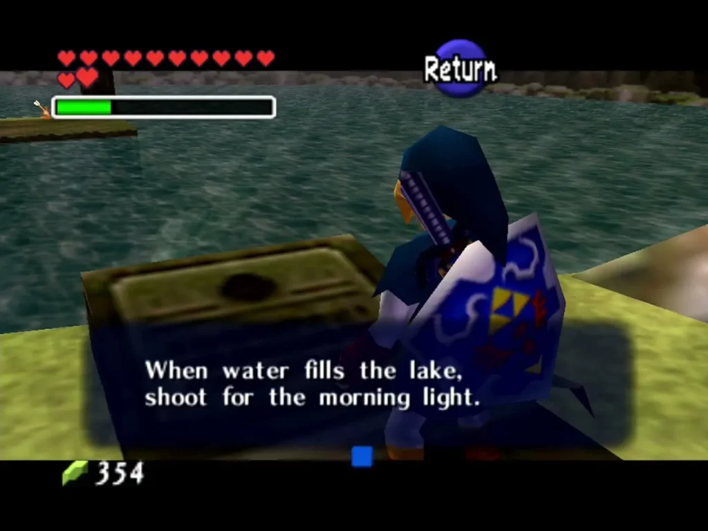 The Triforce emblem on the Lake Hylia shore with the hint to shoot for the morning light The Triforce emblem on the Lake Hylia shore with the hint to shoot for the morning light