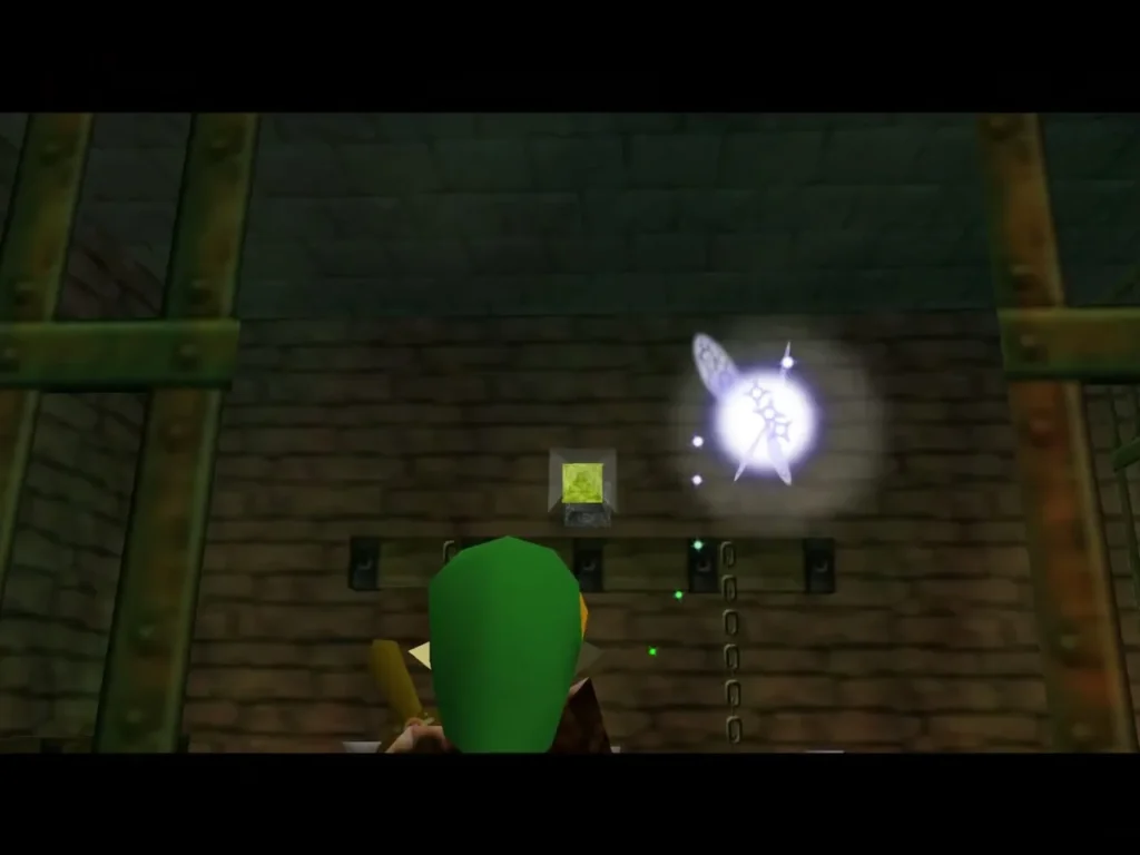 An eye switch glowing on the wall of the alcove in the Bottom of the Well An eye switch glowing on the wall of the alcove in the Bottom of the Well