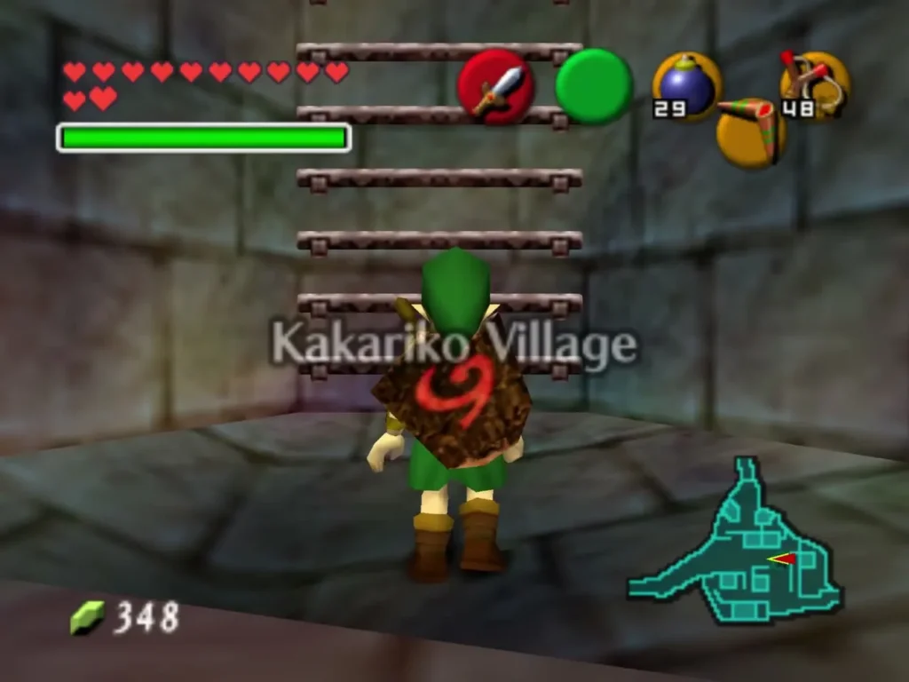 Link standing in a stone room as the Kakariko Village location name appears on screen Link standing in a stone room as the Kakariko Village location name appears on screen
