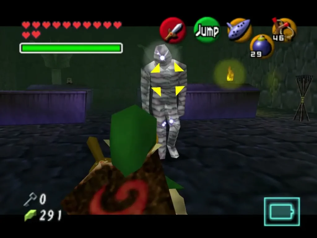 A Gibdo frozen in place by yellow stun markers beside a lit torch A Gibdo frozen in place by yellow stun markers beside a lit torch